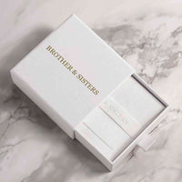 Thumbnail for Minimalist Photo Bracelet packaging by Brother & Sisters, elegant white box with gold logo.