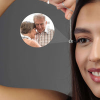 Thumbnail for Personalised Circle Necklace shown by a model, featuring a custom picture inside the pendant. From Brother & Sisters.