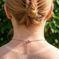 Thumbnail for Minimalist Name Necklace in rose gold lobster clasp and adjustable extension chain seen at the nape | SKU: minimalistnn-rosegold