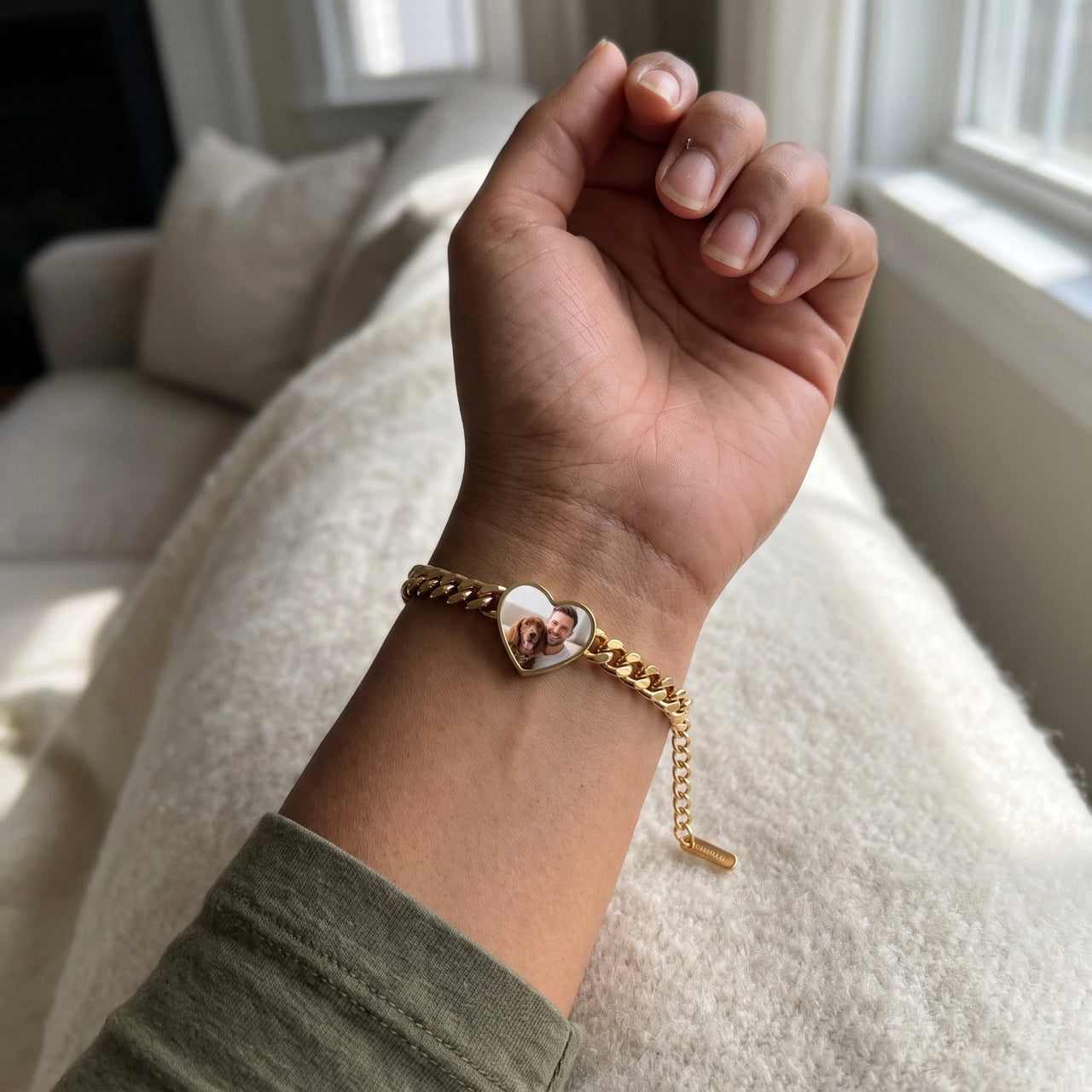 The gold heart photo bracelet on the wrist, showing the lobster clasp and extension chain | SKU: TPH-HRTB-GOLD