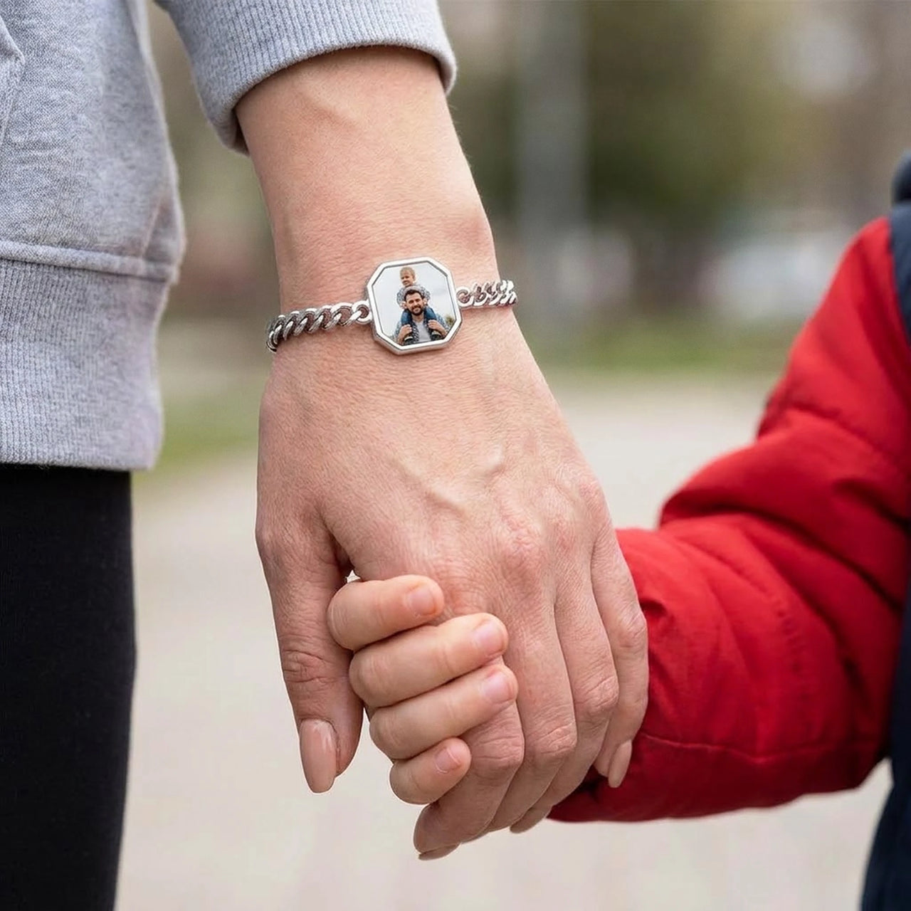 Mother holding her son's hand, the silver octagon photo bracelet on her wrist | SKU: TPH-OCTB-SILVER-18