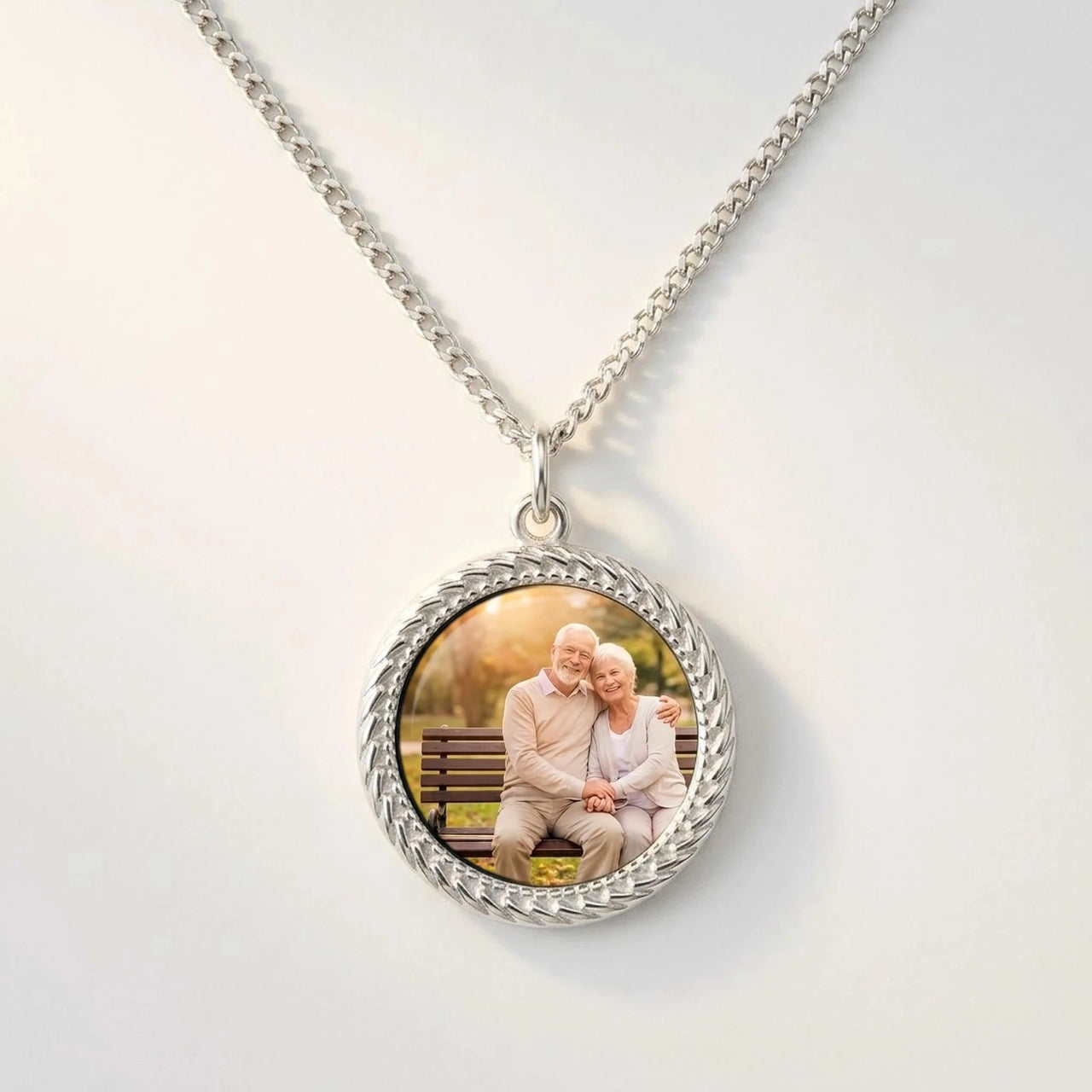 Secret Round Photo Necklace in silver, black round pendant turning into a hidden photo when warmed | SKU: TPH-RNDN-SILVER